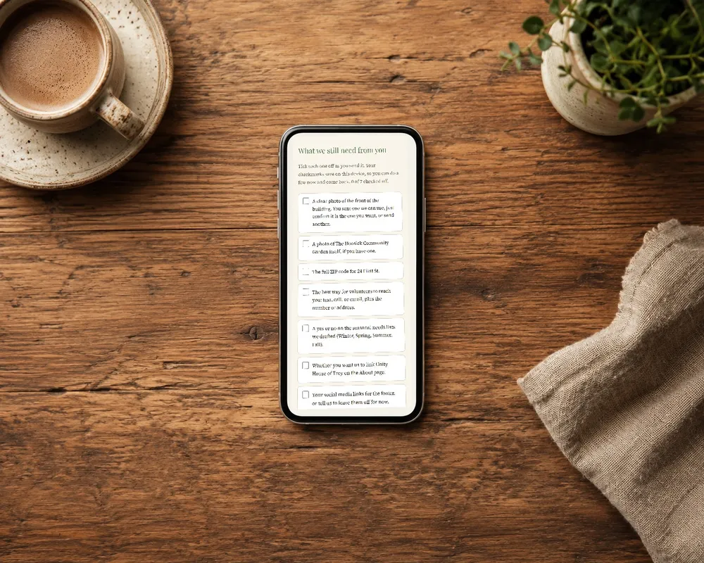 A phone lying on a wooden table showing a client checklist of items still needed, with a progress count.