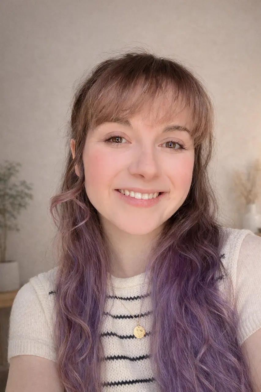 Olivia Keiter, smiling, with long wavy hair.